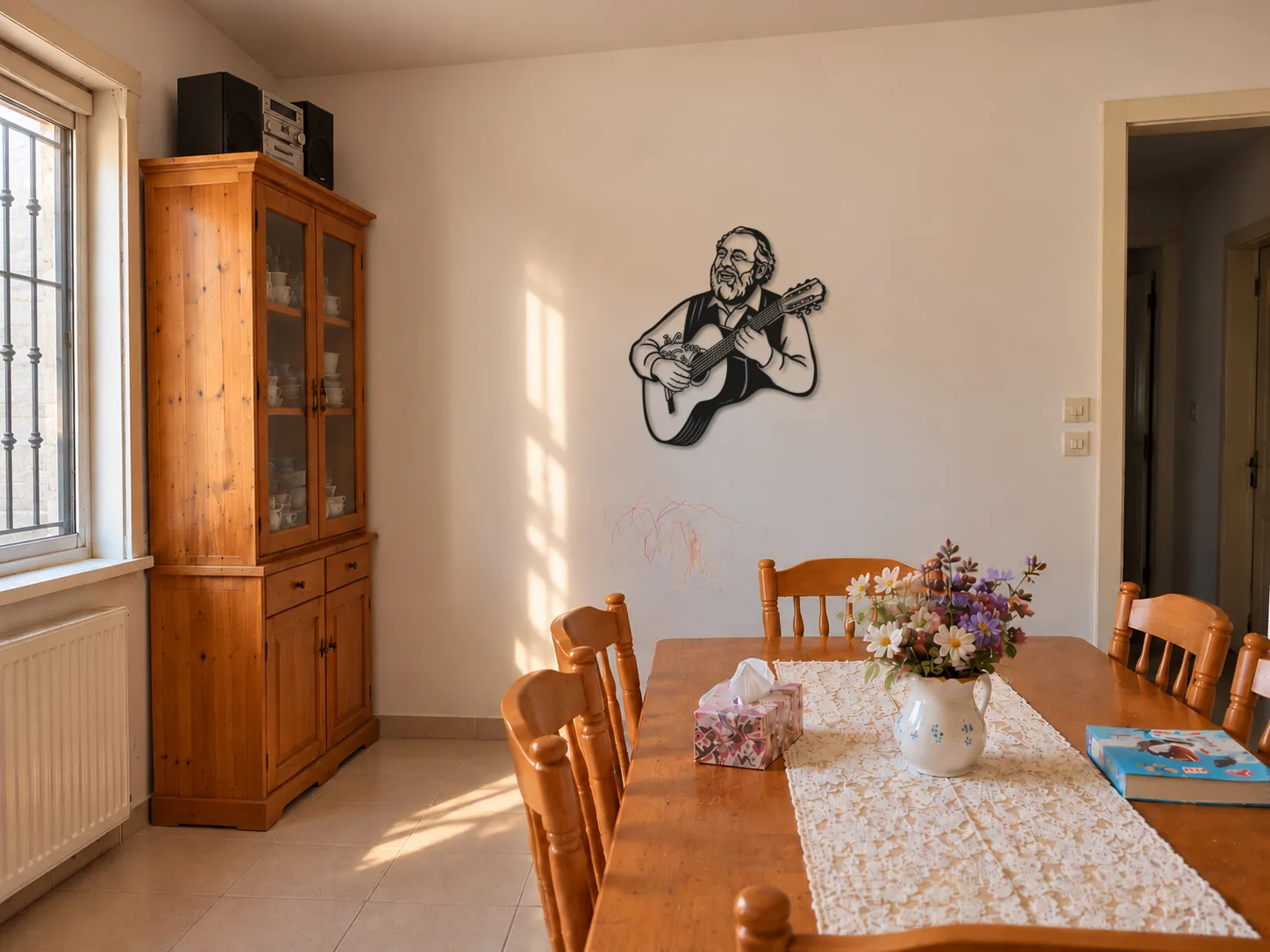 The Joy design on the wall of a family dining nook with flowers